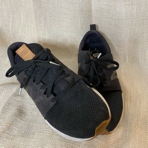 Used black new balance sneakers